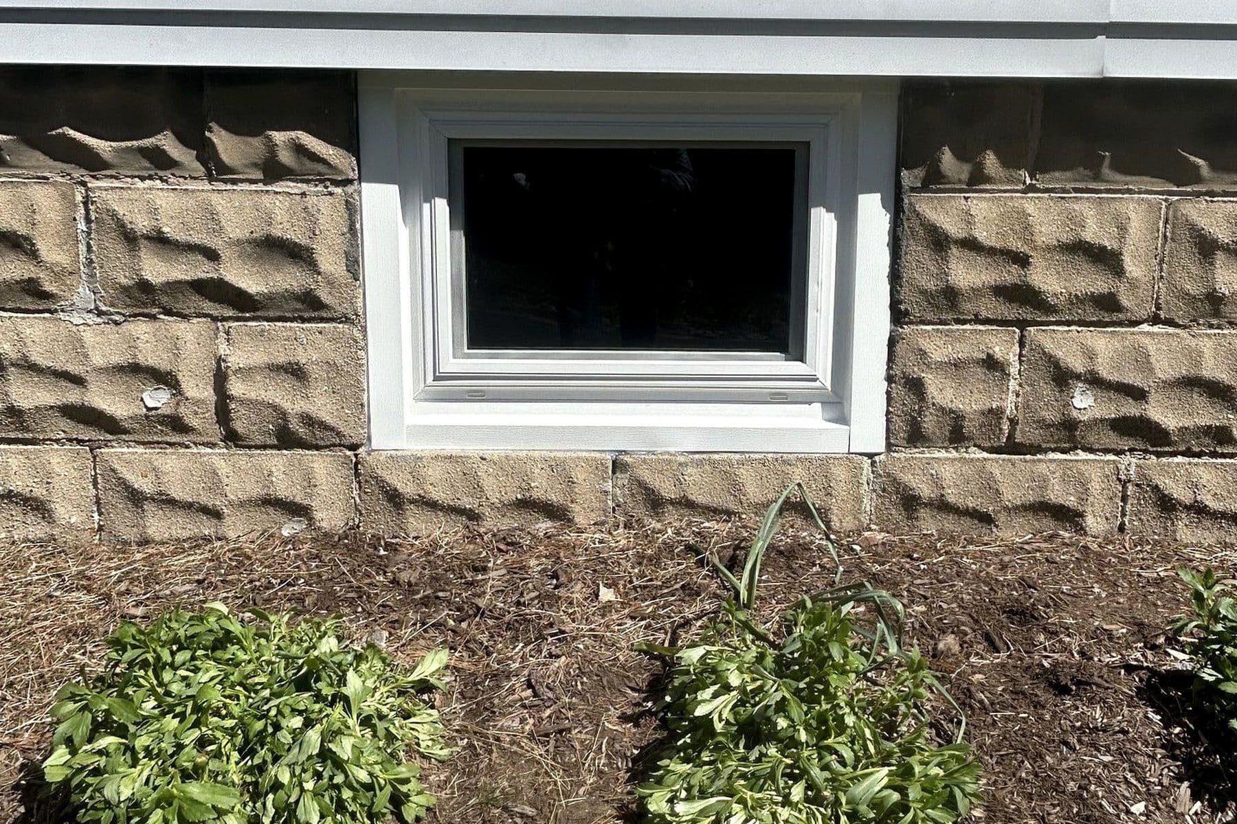 Basement hopper replacement window installed by Kubala Home Improvement