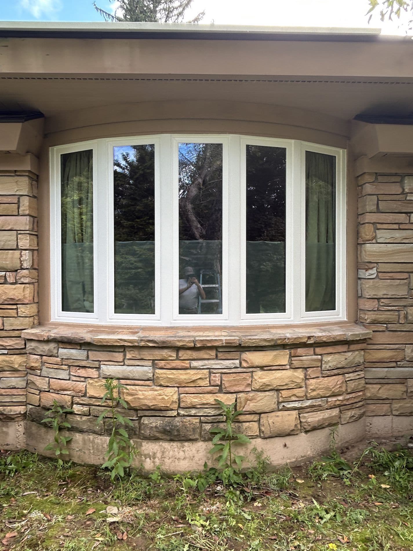 Bow replacement window exterior installation by Kubala Home Improvement